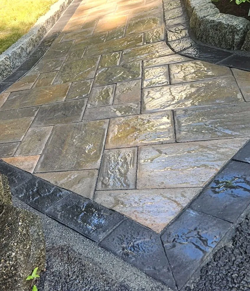Paver walkway with charcoal border and granite edging